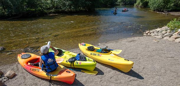 Kayakers taking a break along the Huron River in Ann Arbor.