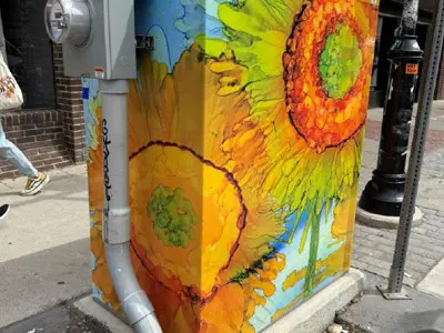 PowerArt! 2025 Golden Paintbrush award winner with art on utility box