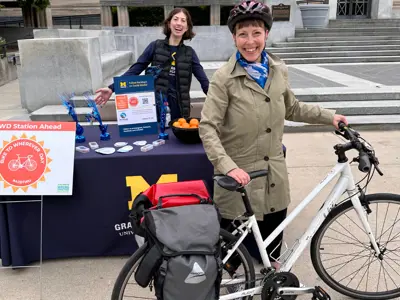 Folks posing with their bikes for Ann Arbor's 2024 Bike to Whevever Day