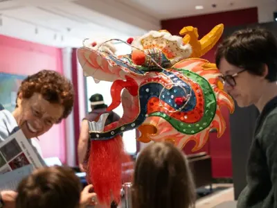 Dragons Everywhere All at Once 2025 Golden Paintbrush Award winner people gathered to see the art